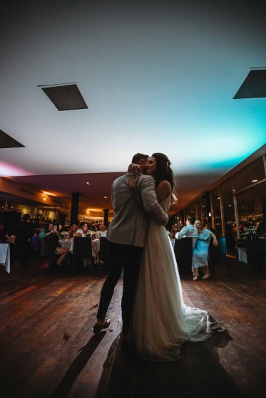 A bride & groom share a first dance during the wedding reception